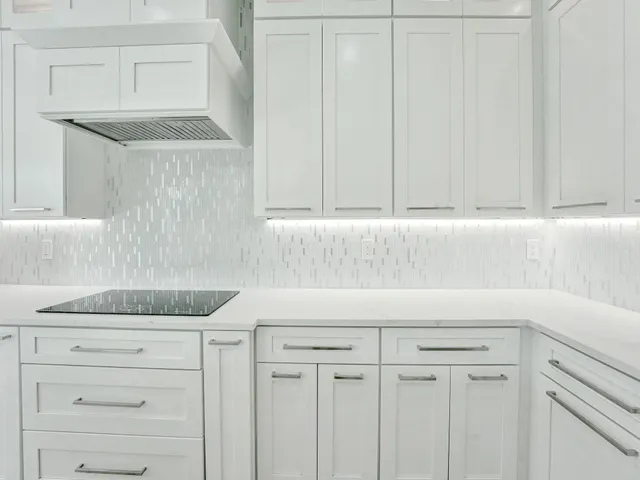 a view of a livingroom with furniture a ceiling fan and window