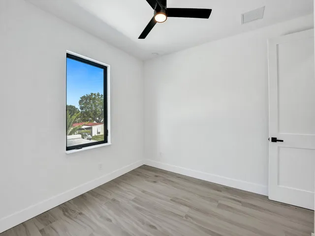 an aerial view of a city with houses