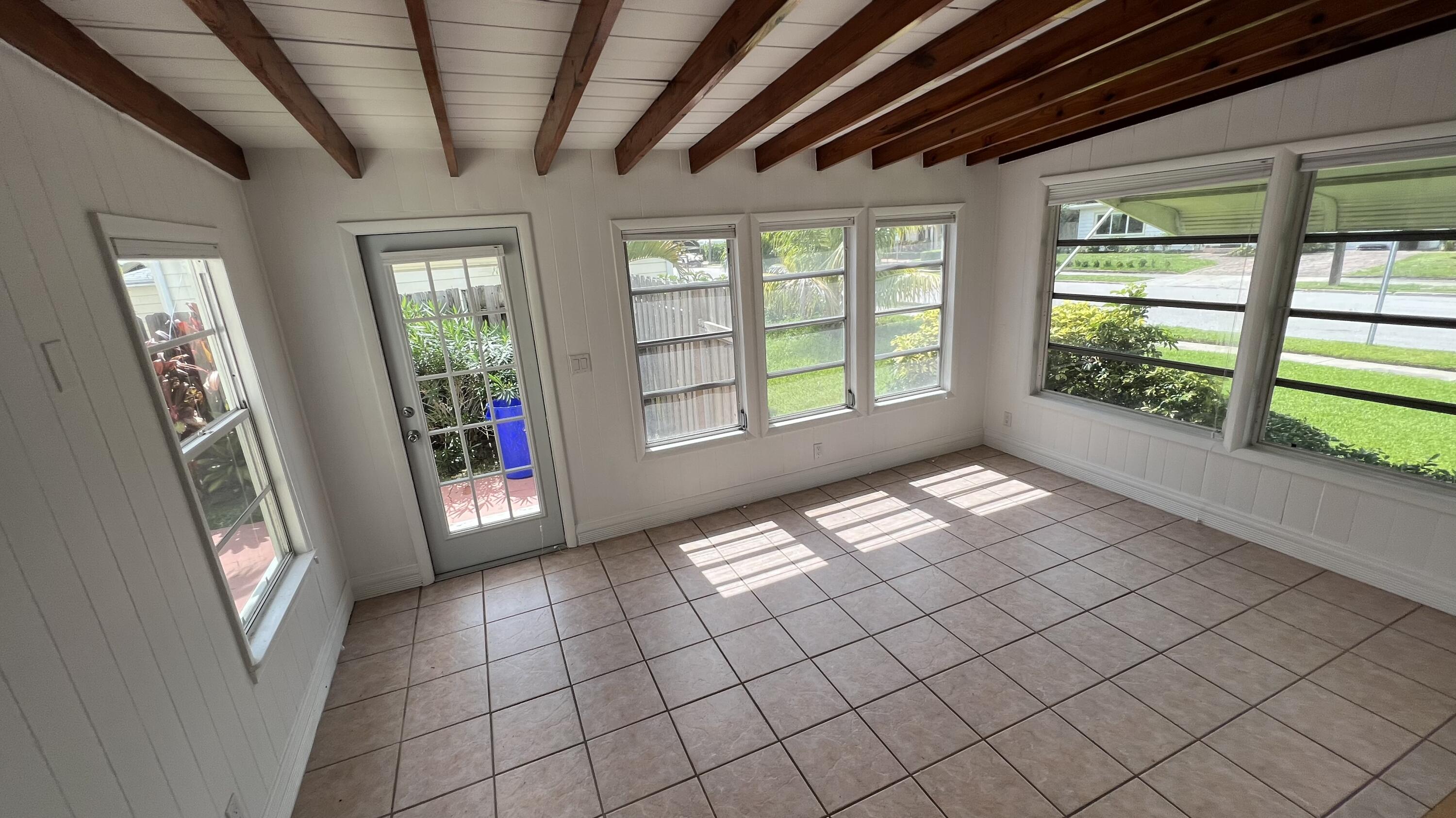 333 Avila Road West Palm Beach, FL 33405 - Photo 4 of 16 Front House Dining:Living Room 2
