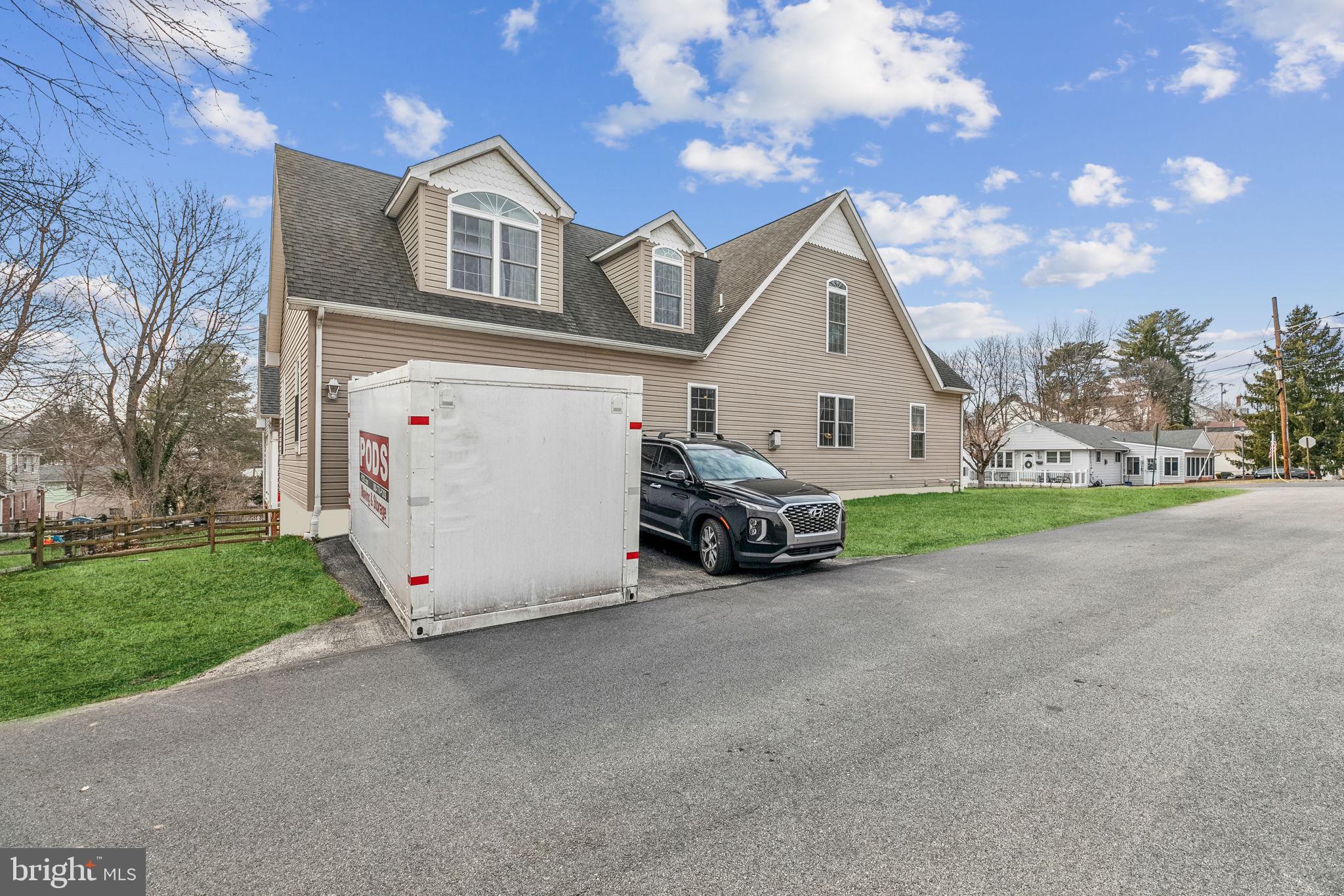 316 Blakeley Road Wallingford, PA 19086 - Photo 33 of 34 a view of a house with a big yard and large tree
