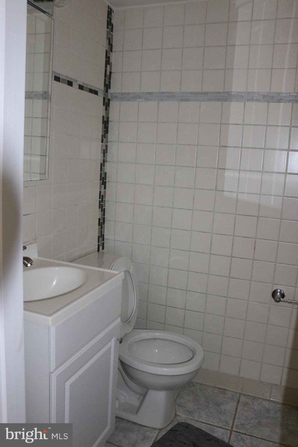 9348 Taney Road Manassas, VA 20110 - Photo 8 of 16 Half bathroom
