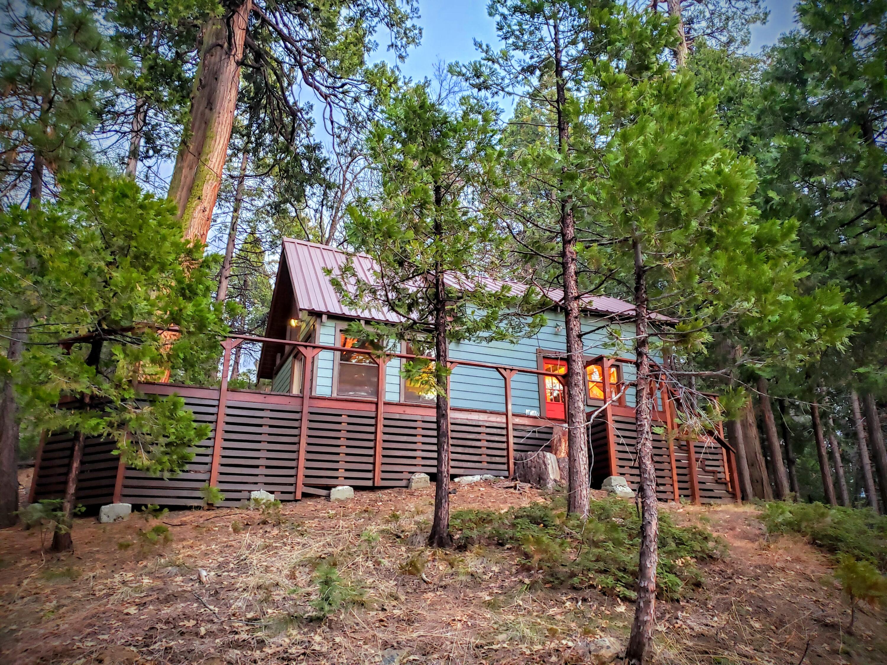 51867 Cedar Road Cedar Slope, CA 93265 - Photo 35 of 38 32-Cabin in the evening