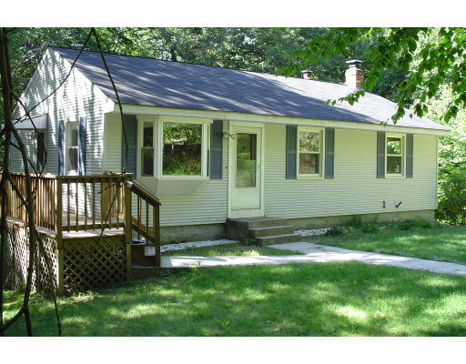 1469 Richardson Road Ashby, MA 01431 - Photo 1 of 6 a view of a house with a yard