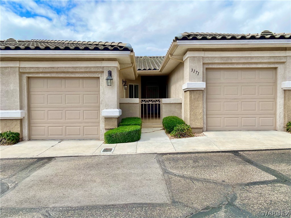 3171 Partridge Run Street Laughlin, NV 89029 - Photo 1 of 36 front view of a house