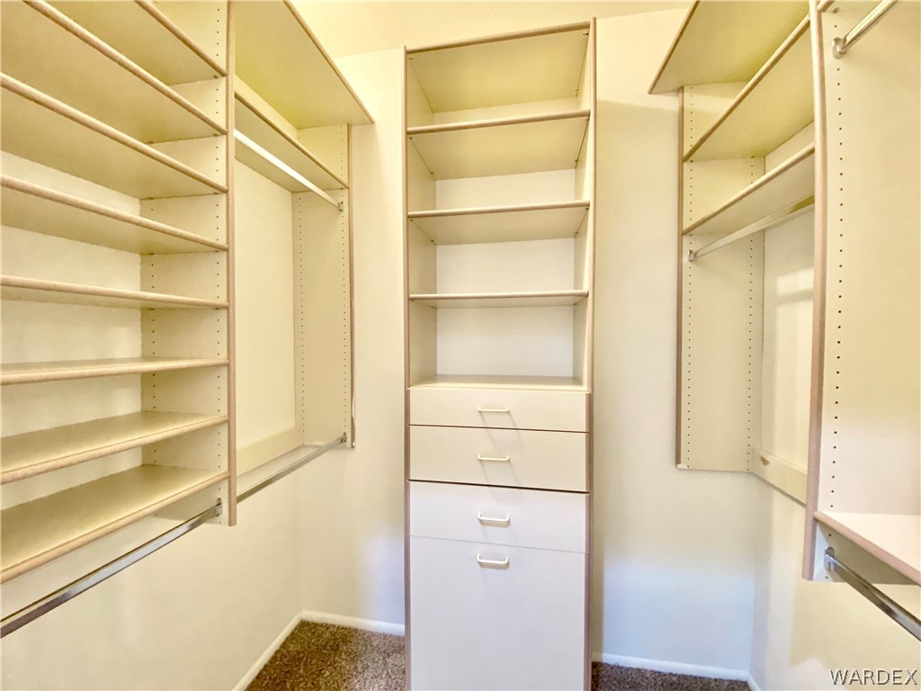 3171 Partridge Run Street Laughlin, NV 89029 - Photo 23 of 36 a view of walk in closet with empty racks