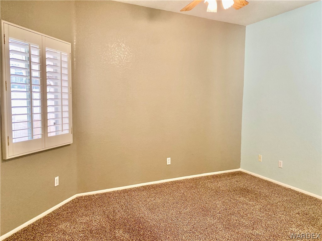 3171 Partridge Run Street Laughlin, NV 89029 - Photo 24 of 36 a view of an empty room with a window