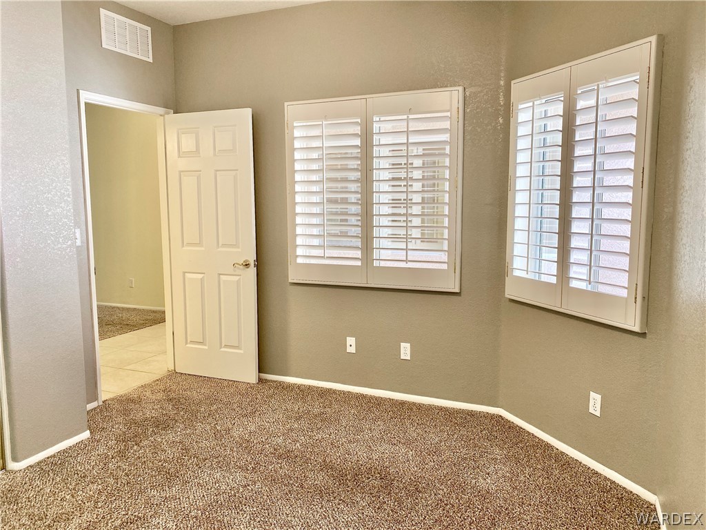 3171 Partridge Run Street Laughlin, NV 89029 - Photo 26 of 36 a view of a livingroom with an empty space and window