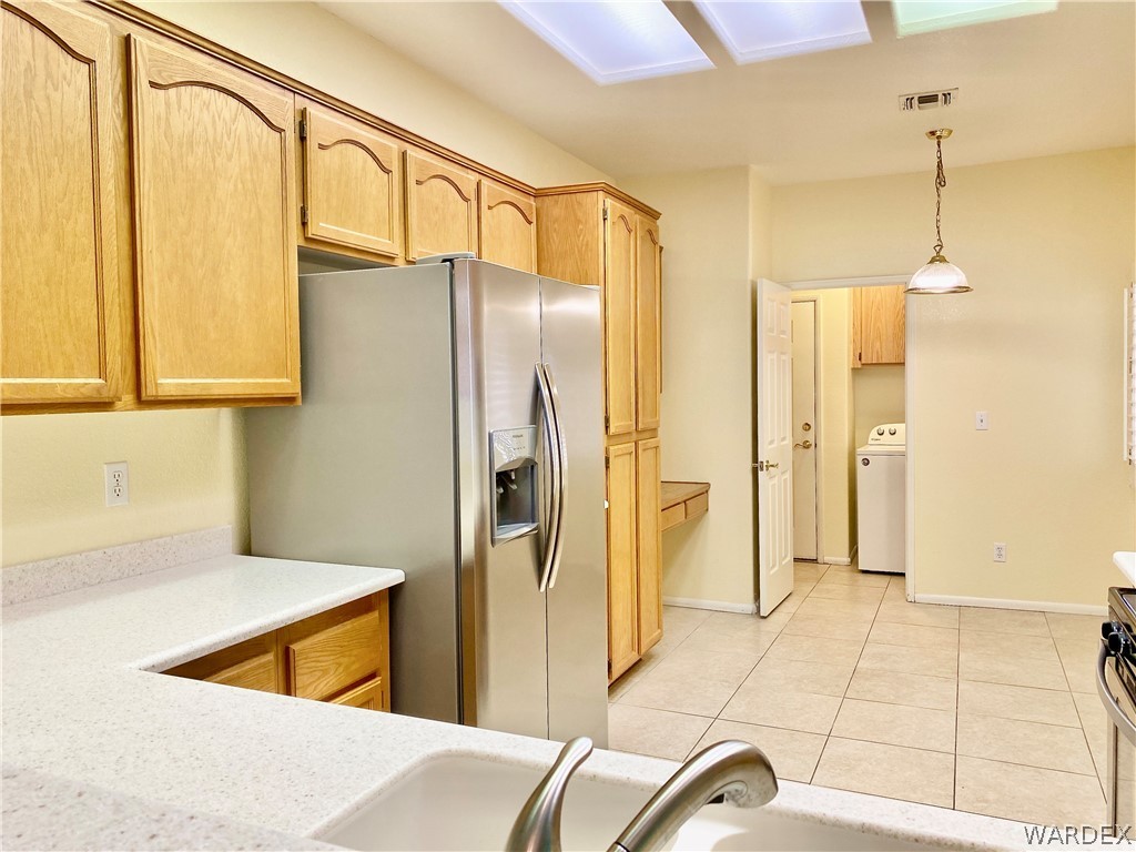 3171 Partridge Run Street Laughlin, NV 89029 - Photo 9 of 36 a bathroom with a bathtub and a shower