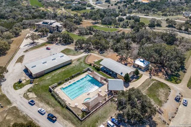 an aerial view of a house with a garden