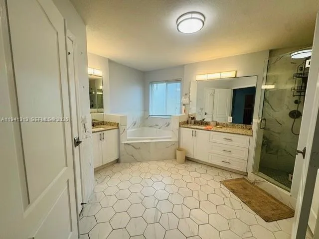 a bathroom with a toilet and a mirror