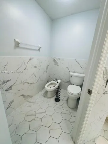 a view of a backyard of the house