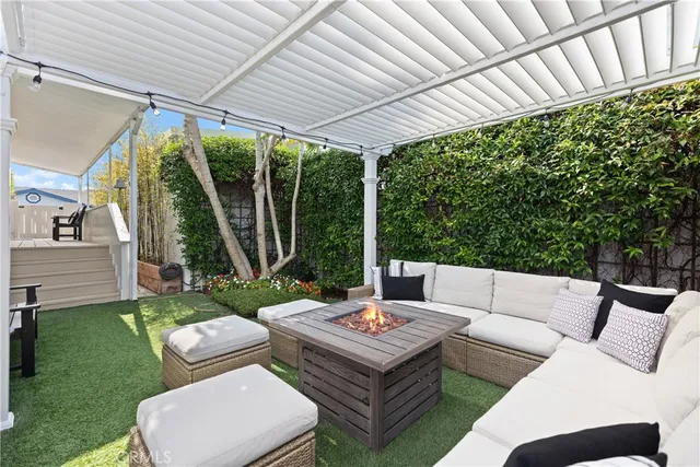 a view of a lake with houses in the back