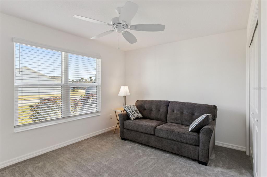 6338 Flaxmayer Road The Villages, FL 32163 - Photo 15 of 19 a living room with furniture and a window