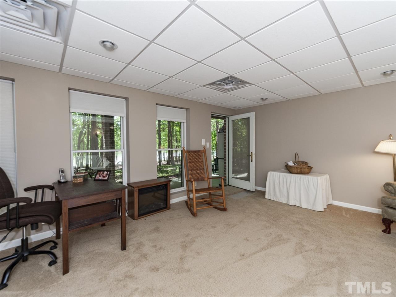 3425 Thomas Road Henderson, NC 27537 - Photo 17 of 25 a living room with furniture and a large window