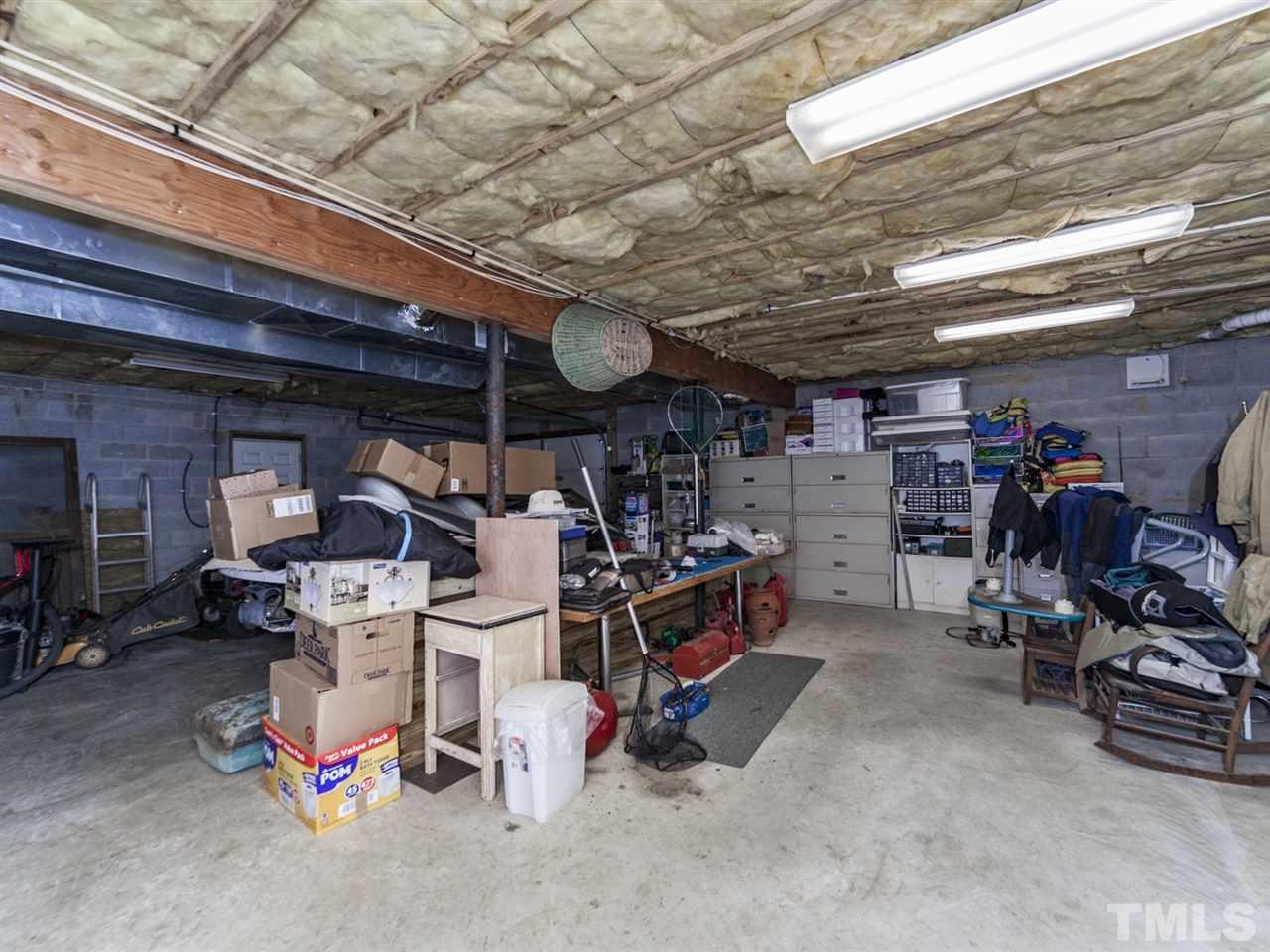 3425 Thomas Road Henderson, NC 27537 - Photo 19 of 25 a view of a storage with a lot of stuff