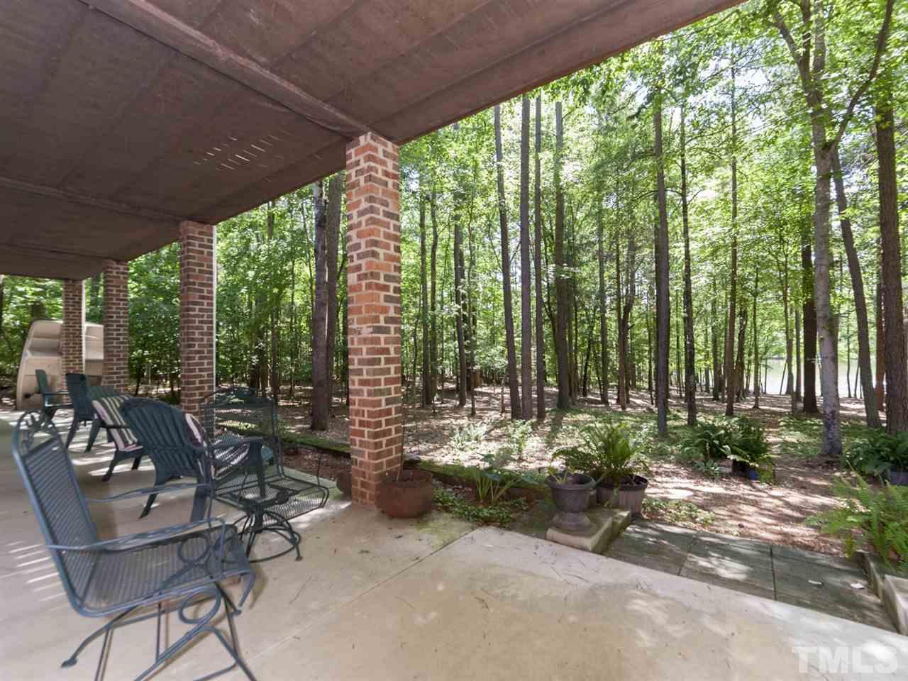 3425 Thomas Road Henderson, NC 27537 - Photo 20 of 25 a view of a patio with chairs and tables in the patio