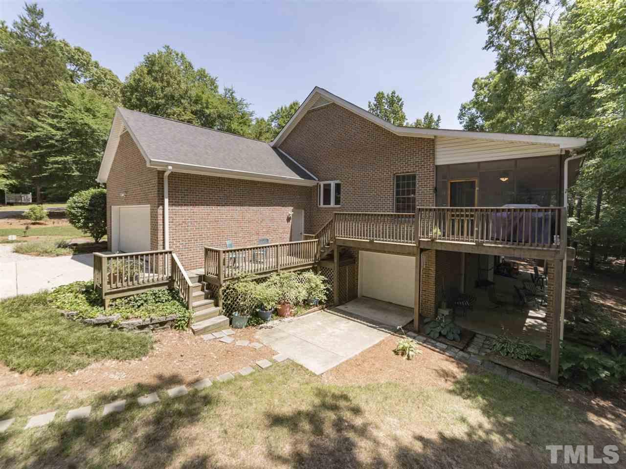 3425 Thomas Road Henderson, NC 27537 - Photo 4 of 25 a view of backyard with a sink and outdoor seating