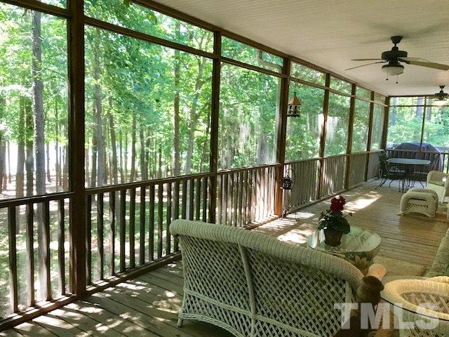 3425 Thomas Road Henderson, NC 27537 - Photo 9 of 25 a living room with large windows