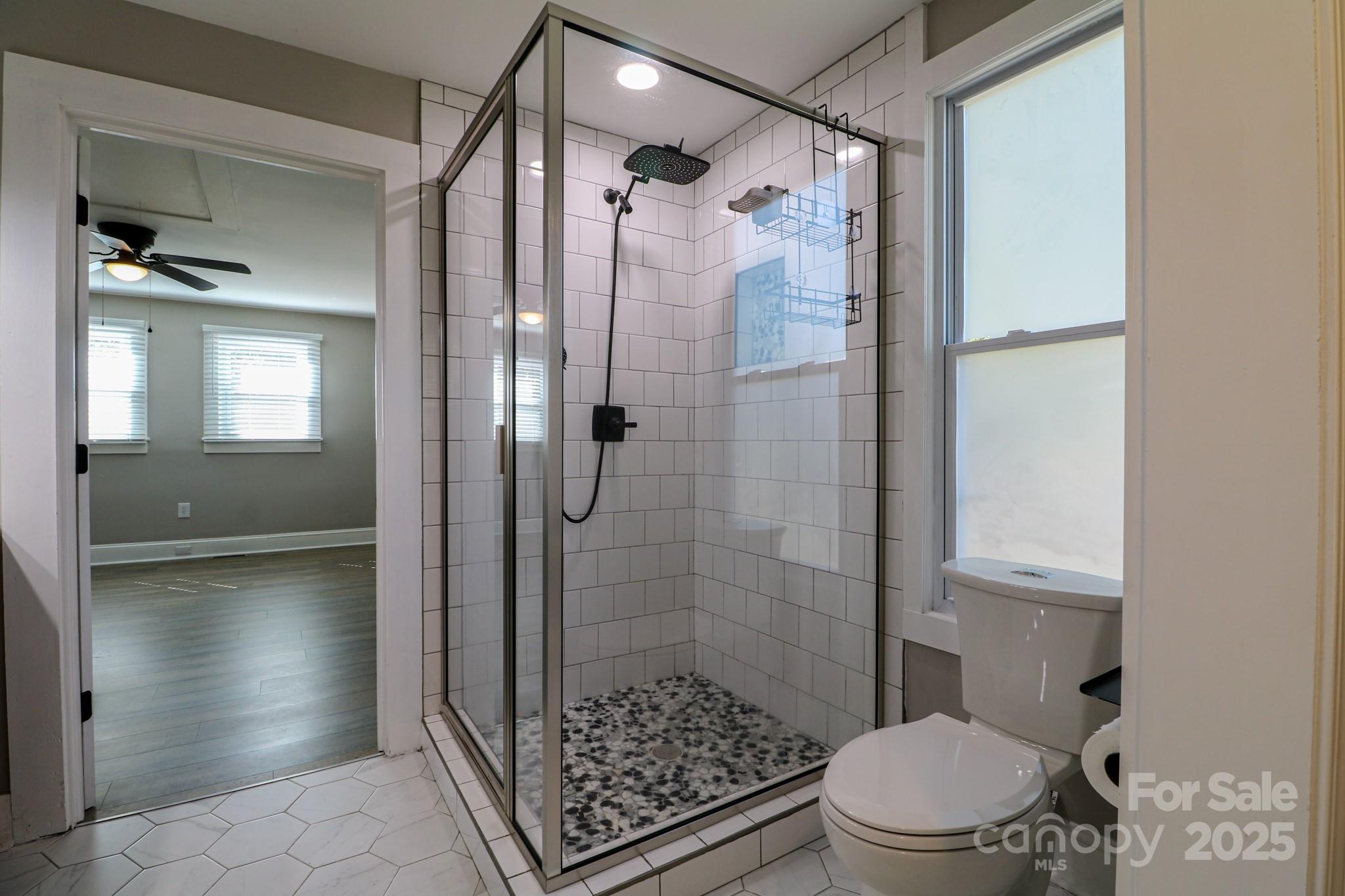 455 Stone Road Salisbury, NC 28146 - Photo 14 of 30 a bathroom with a shower and a toilet