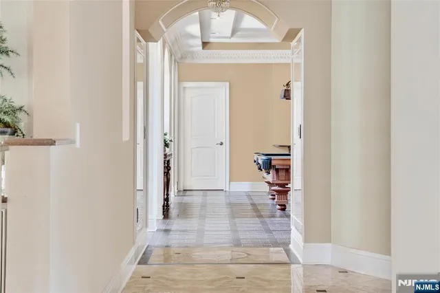 a view of a hallway view of a living room