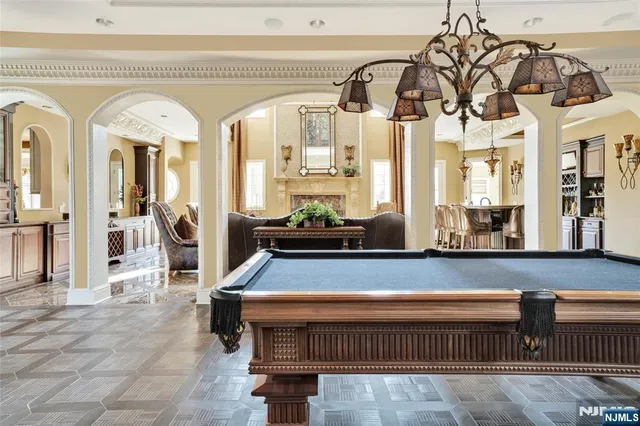 a view of swimming pool with outdoor seating