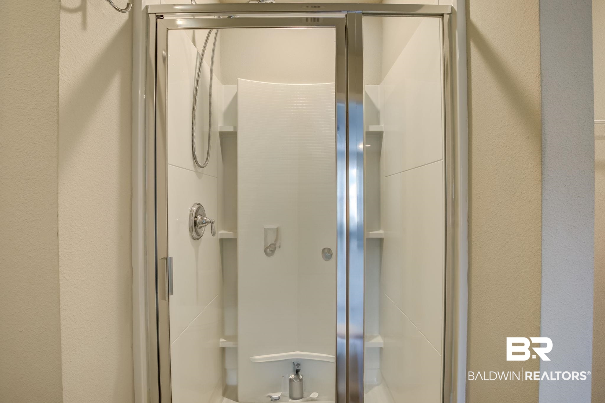 25806 Pollard Road, Unit 60 Daphne, AL 36526 - Photo 25 of 35 Bathroom featuring an enclosed shower