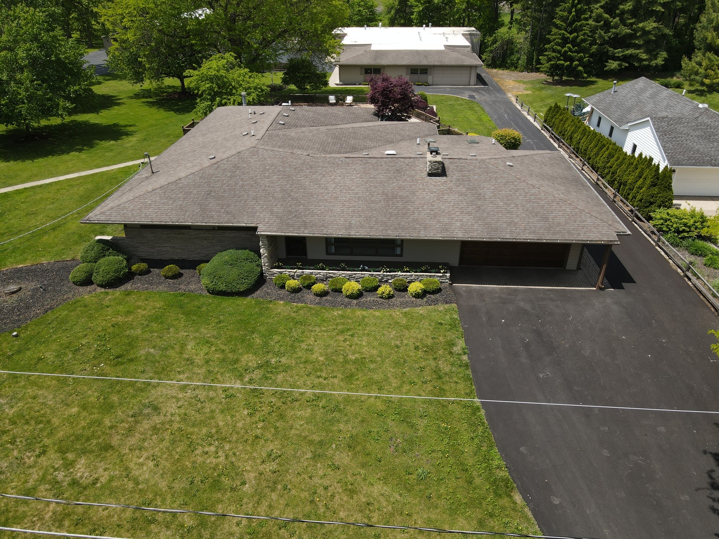 37756-88 North Cedar Lake Road Lake Villa, IL 60046 - Photo 4 of 79 a view of a swimming pool with a yard and plants