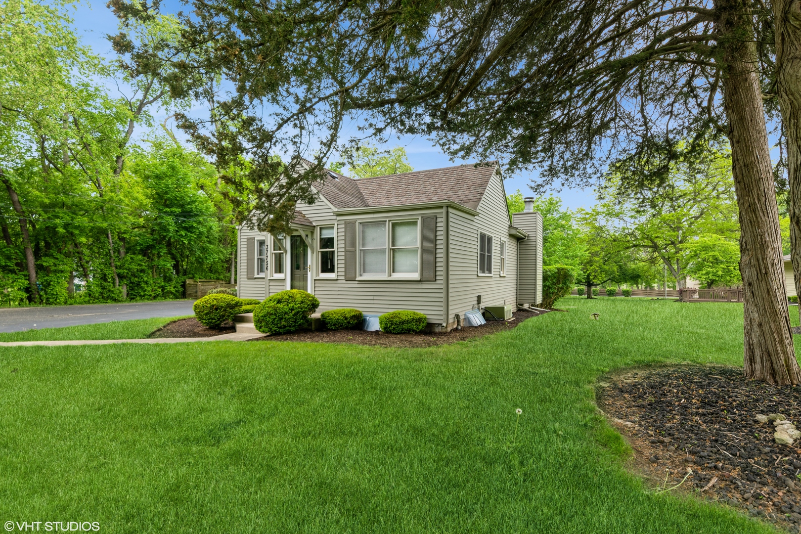 37756-88 North Cedar Lake Road Lake Villa, IL 60046 - Photo 46 of 79 a front view of a house with a yard