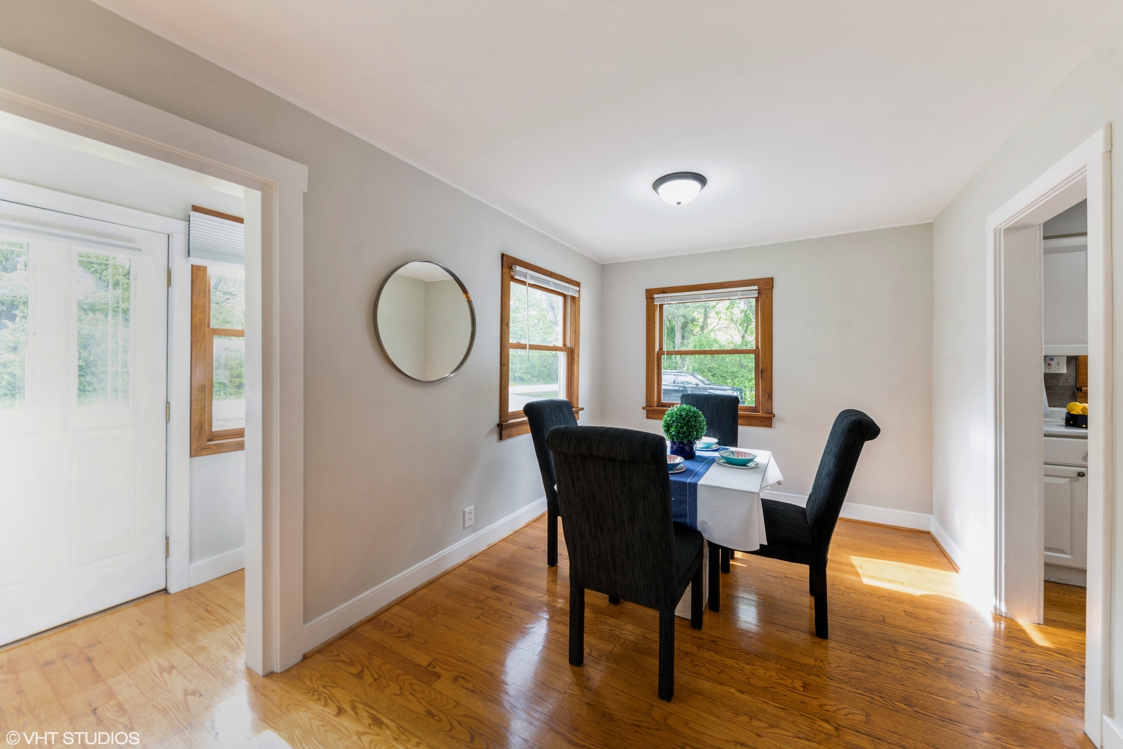37756-88 North Cedar Lake Road Lake Villa, IL 60046 - Photo 55 of 79 a dining room with furniture a window and wooden floor