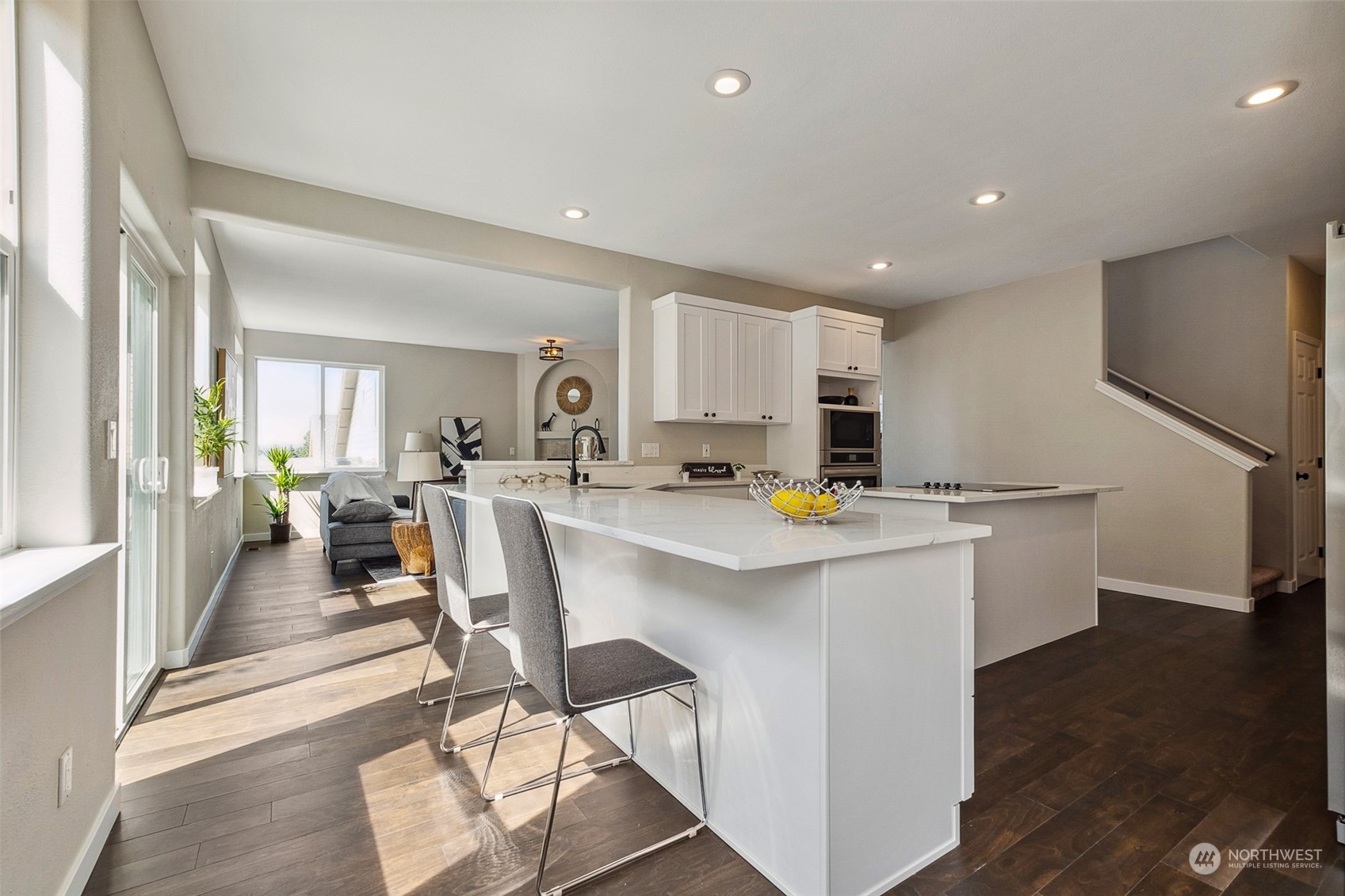 1203 South 35th Street Renton, WA 98055 - Photo 14 of 38 a view of kitchen with stainless steel appliances refrigerator stove dining table and chairs
