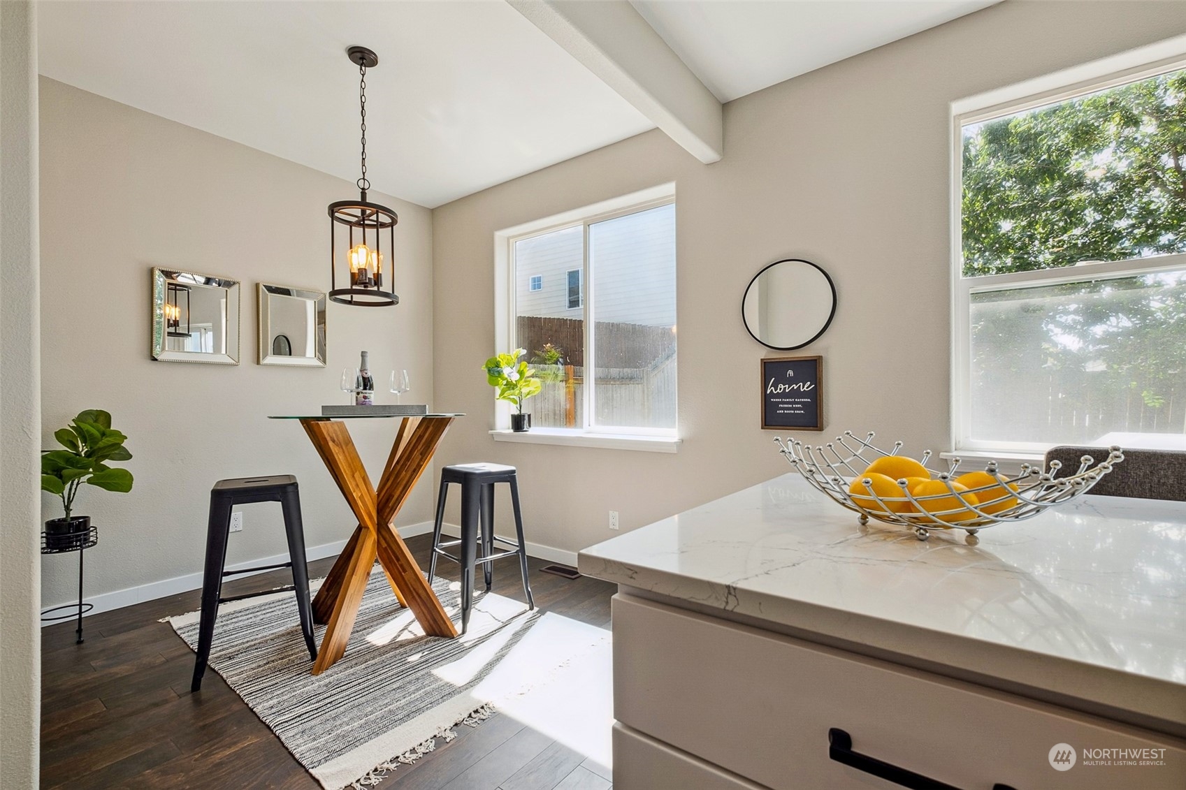 1203 South 35th Street Renton, WA 98055 - Photo 17 of 38 a view of a workspace with furniture and a window