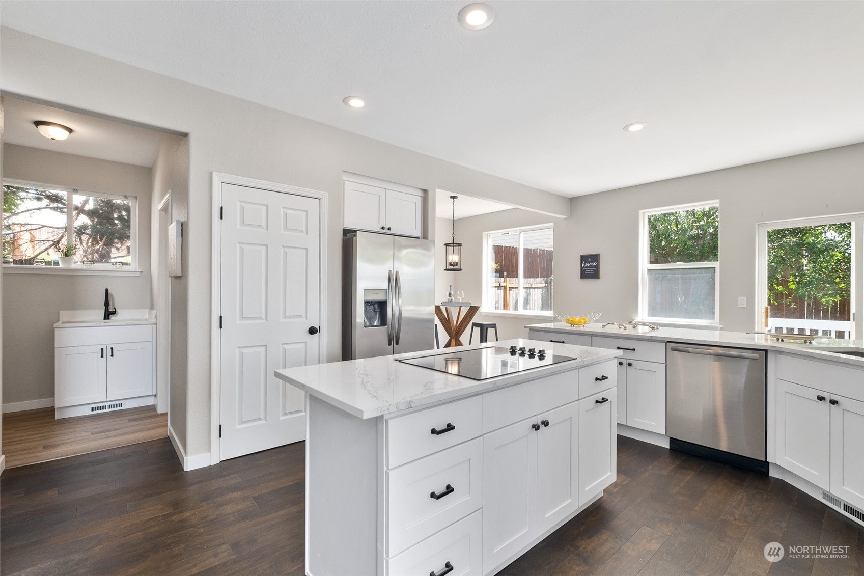 1203 South 35th Street Renton, WA 98055 - Photo 21 of 38 a spacious bathroom with a double vanity sink a mirror and a bathtub