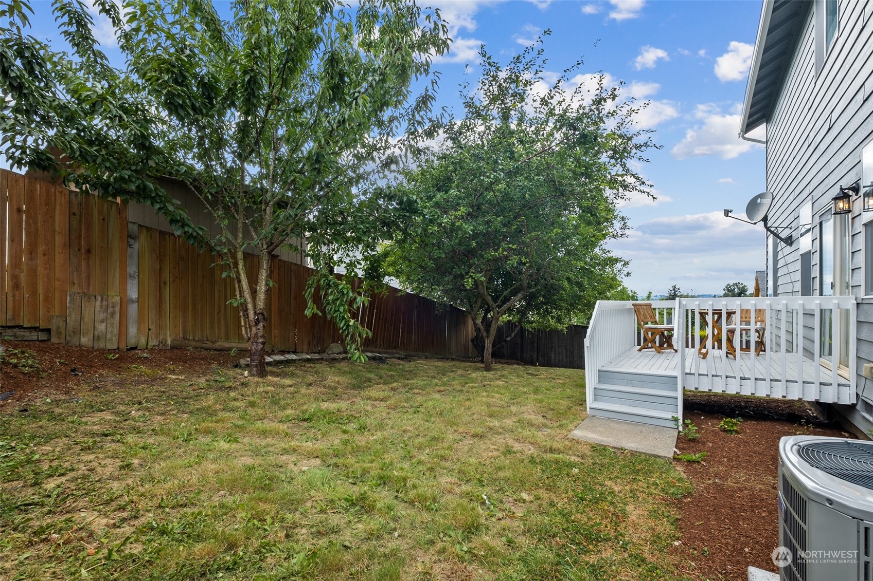 1203 South 35th Street Renton, WA 98055 - Photo 37 of 38 a view of a house with a yard