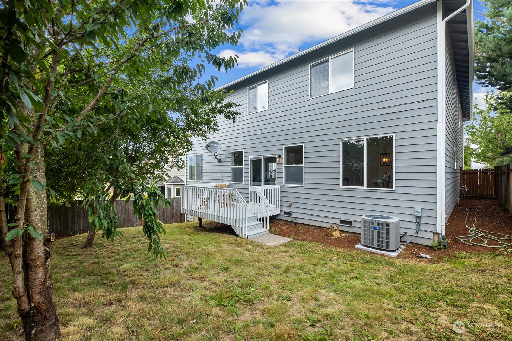 1203 South 35th Street Renton, WA 98055 - Photo 38 of 38 a view of a house with a yard