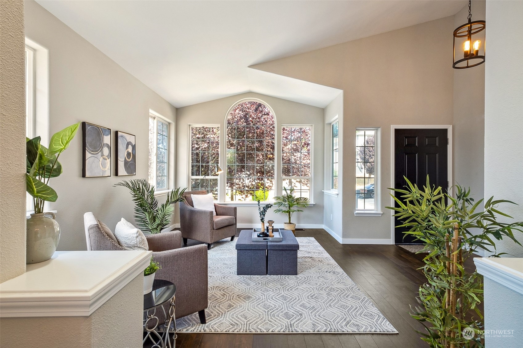1203 South 35th Street Renton, WA 98055 - Photo 7 of 38 a living room with furniture potted plant and windows