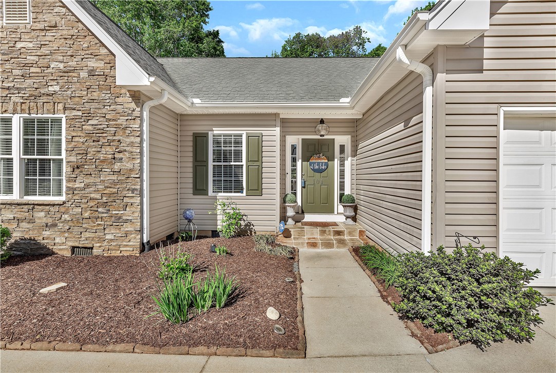 101 Riviera Circle Anderson, SC 29621 - Photo 4 of 35 This welcoming entry features a combination of stone and siding, complemented by a neatly landscaped pathway.