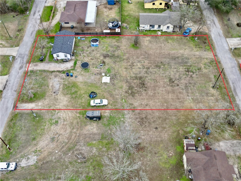 Total of four lots to either develop or reside on a huge oversized lot.
