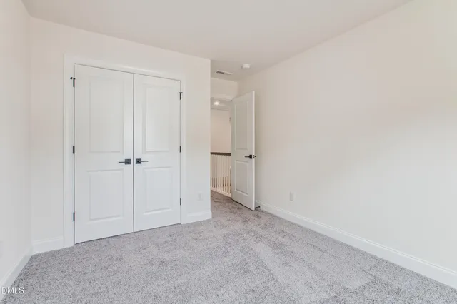 a black and white photo of a rug