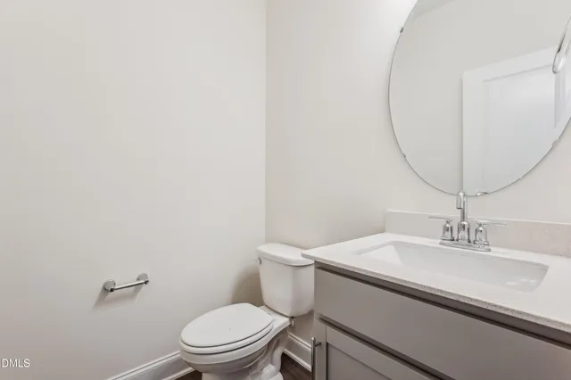 a view of a small space with wooden floor