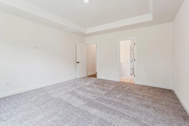 a black and white photo of a living room