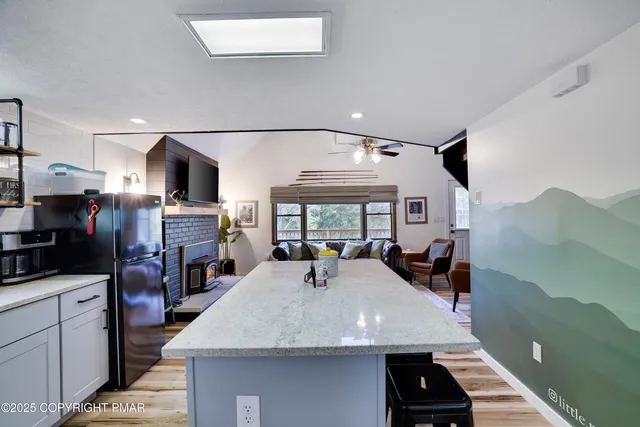 a kitchen with a stove and cabinets