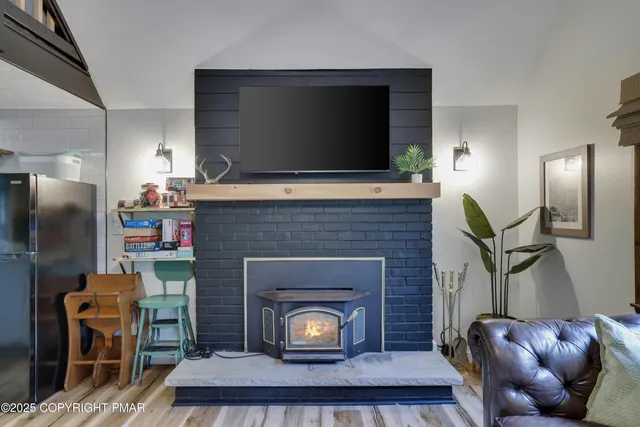 a living room with furniture and a gate