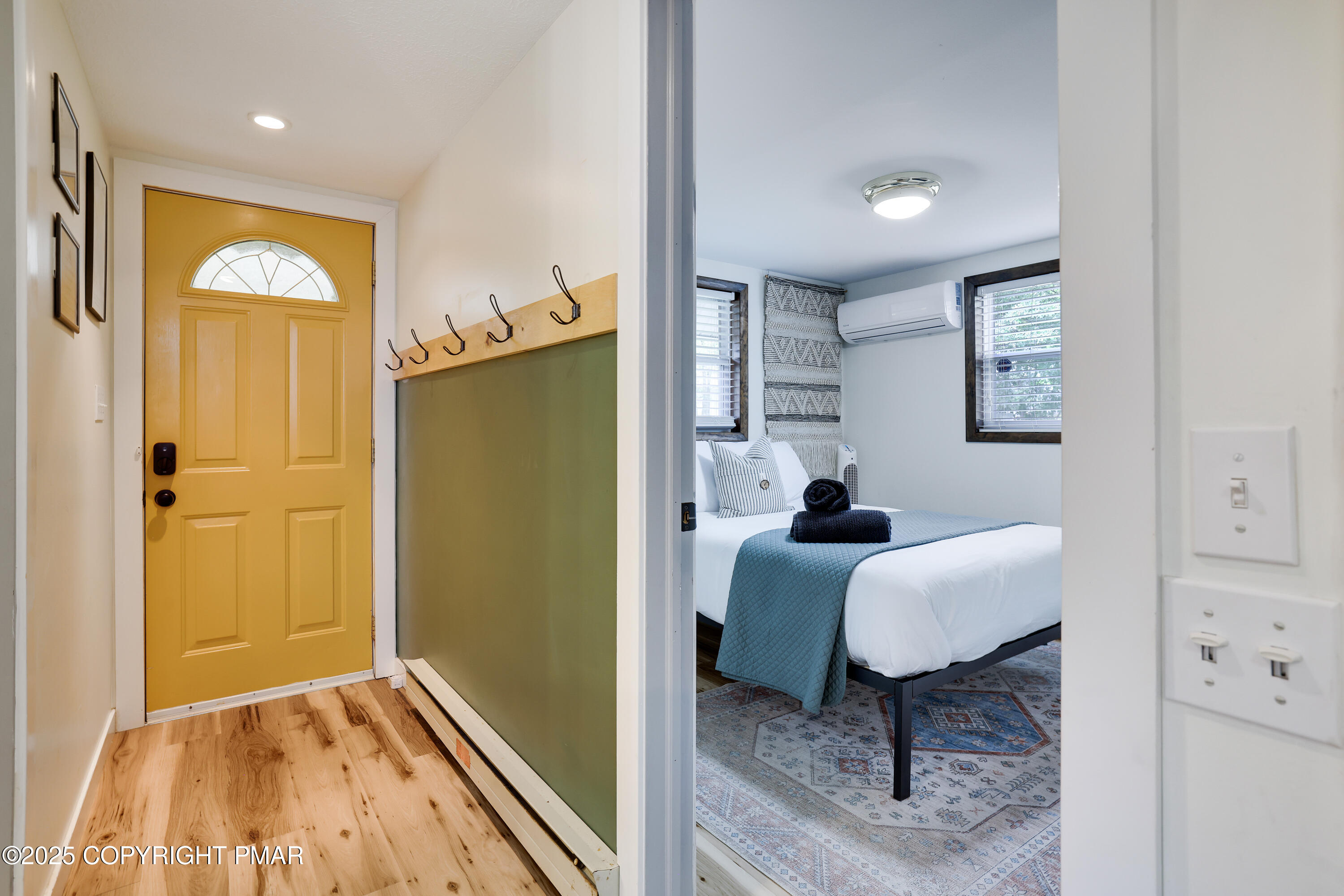 Undisclosed Address Pocono Lake, PA 18347 - Photo 20 of 50 a living room with furniture and a gate