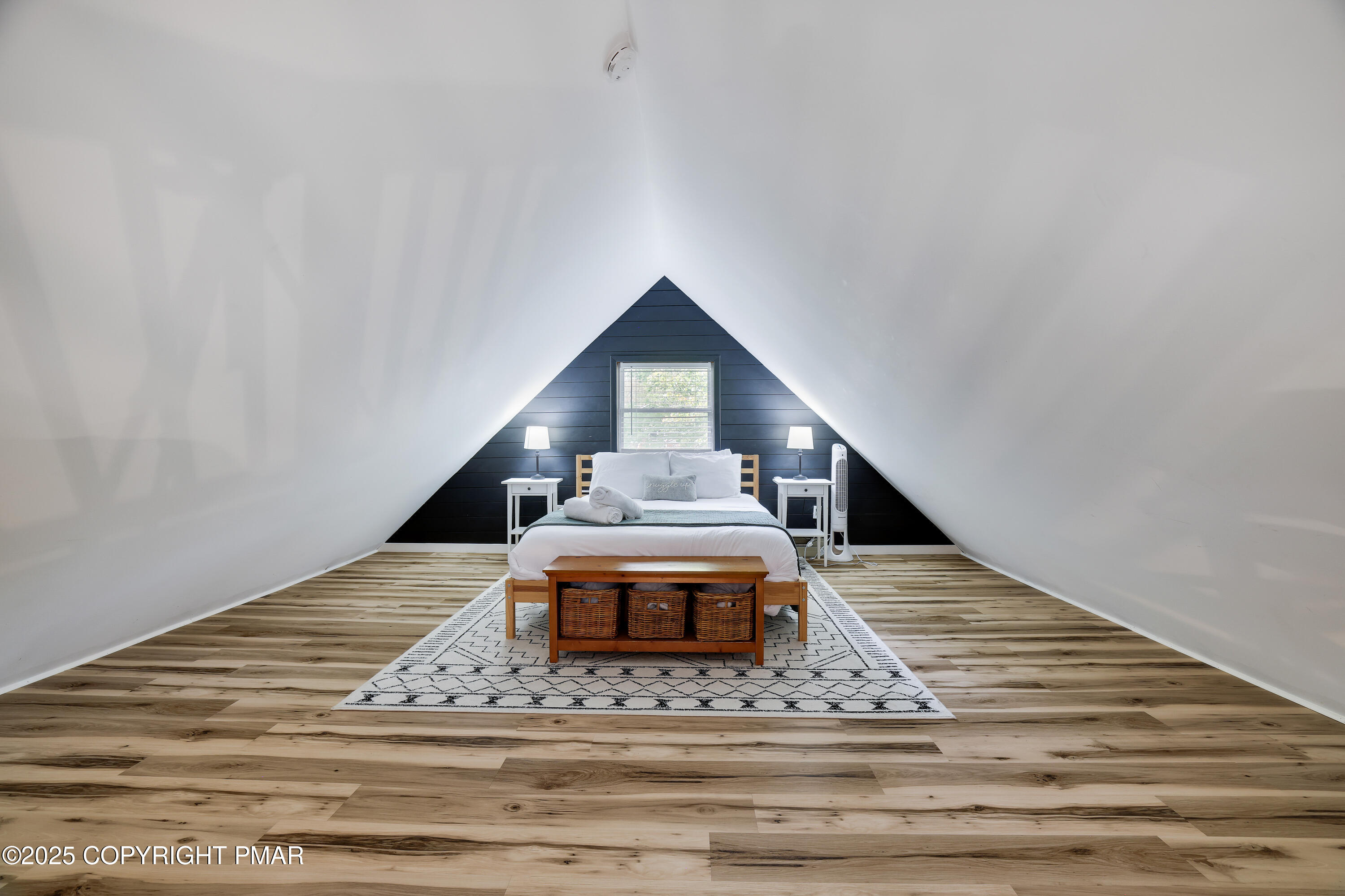 Undisclosed Address Pocono Lake, PA 18347 - Photo 29 of 50 a view of a hallway with wooden floor and staircase