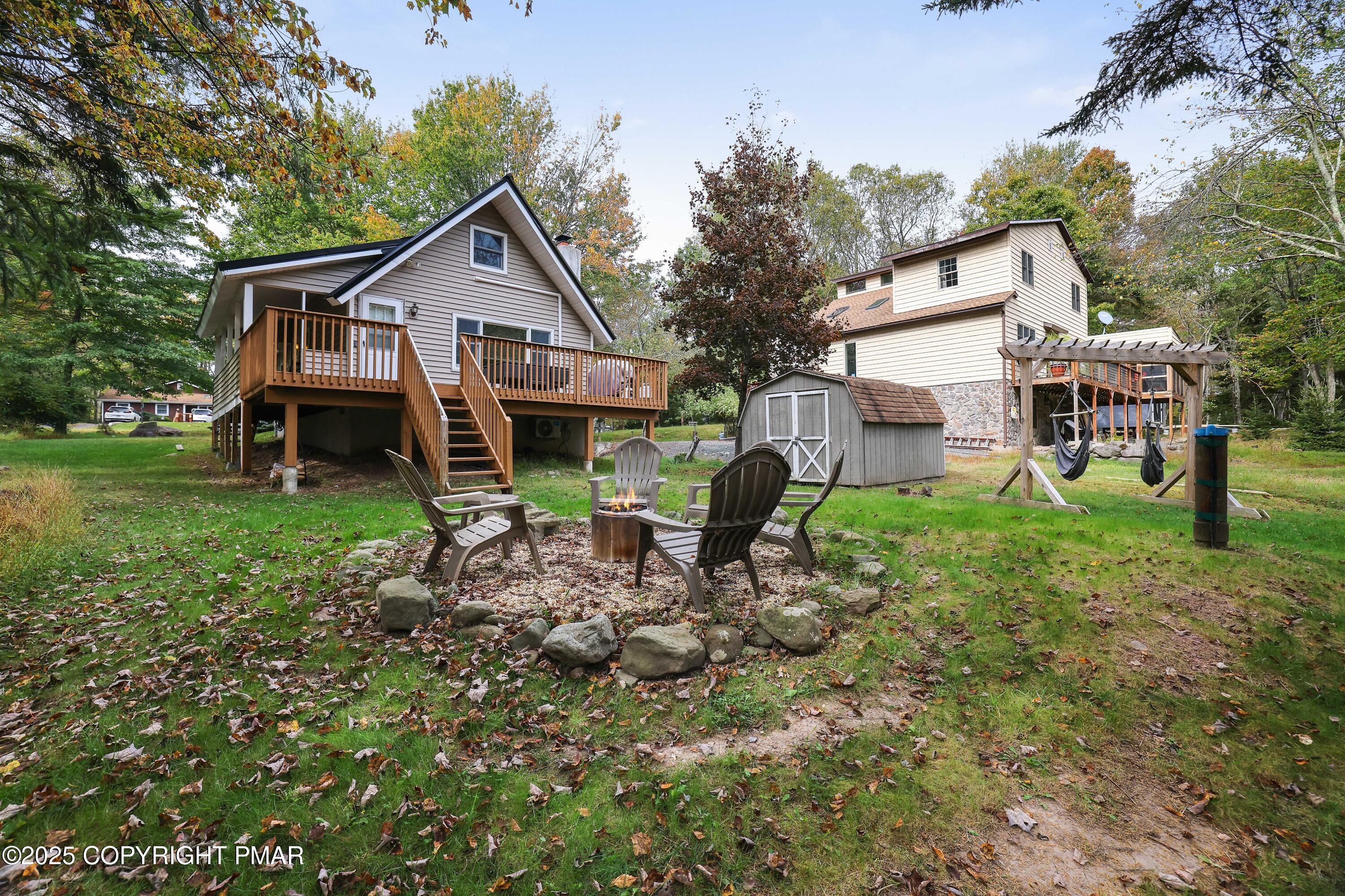 Undisclosed Address Pocono Lake, PA 18347 - Photo 36 of 50 a front view of a house with garden