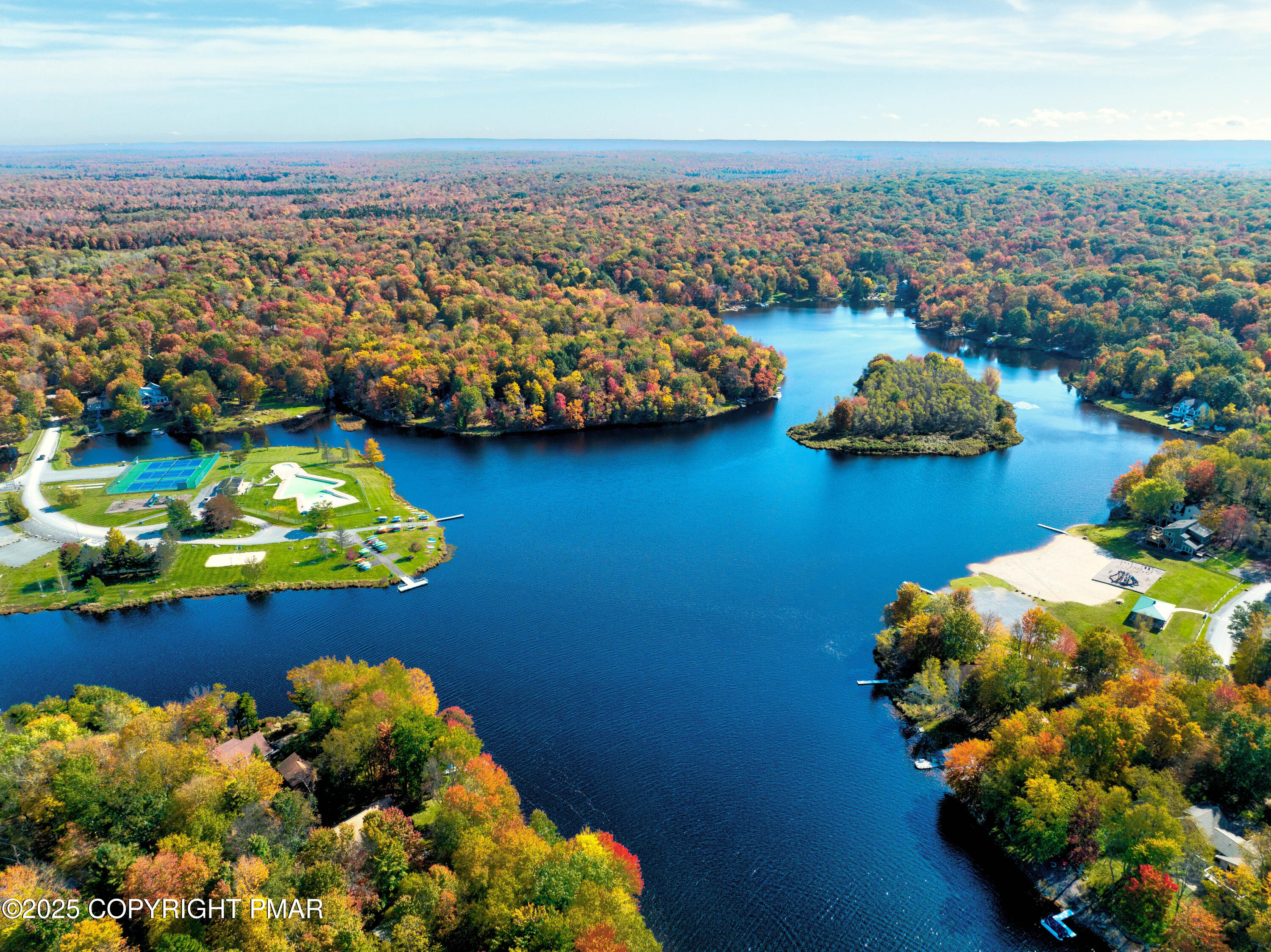 Undisclosed Address Pocono Lake, PA 18347 - Photo 45 of 50 an aerial view of a house with a ocean view