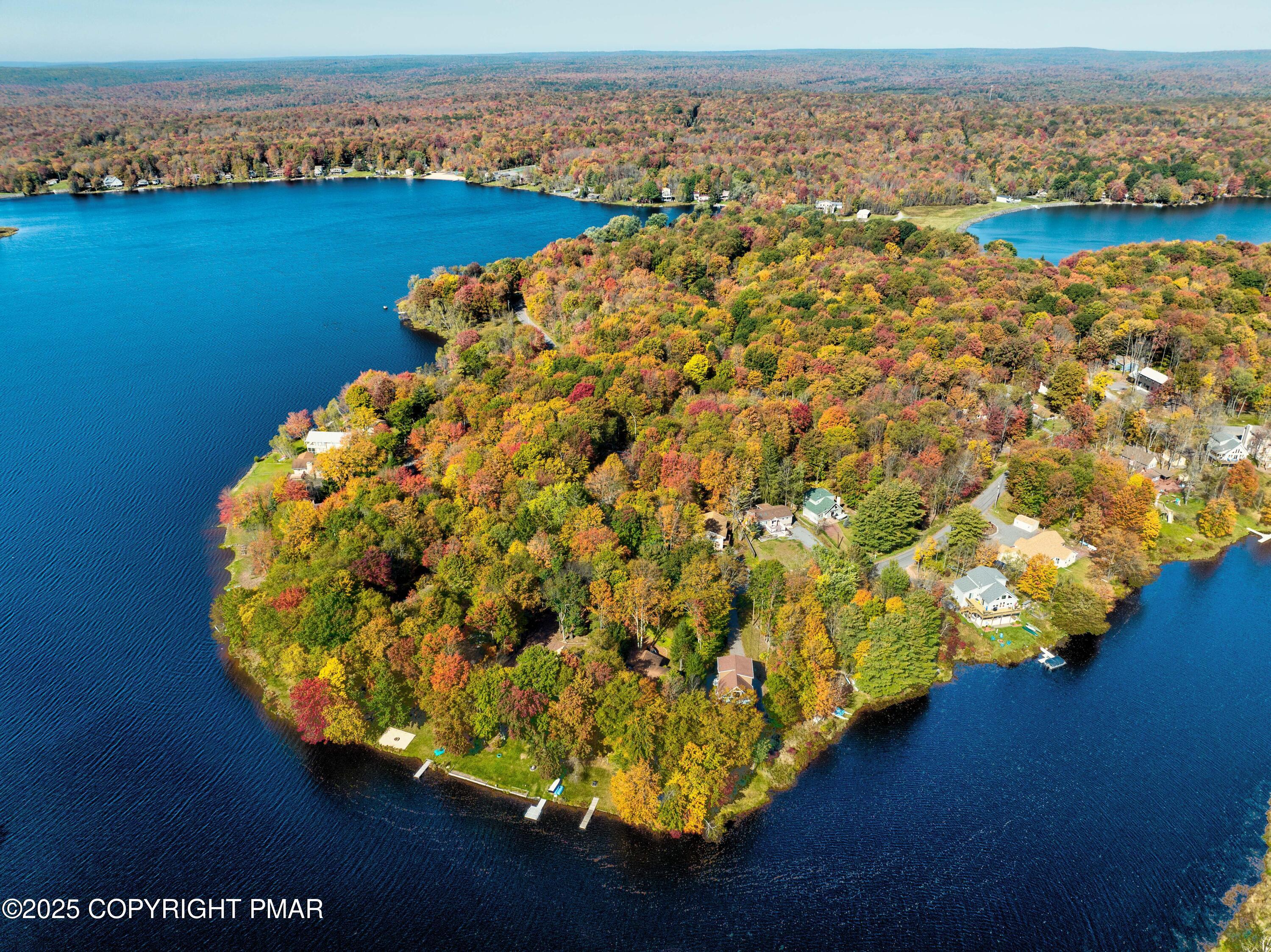Undisclosed Address Pocono Lake, PA 18347 - Photo 49 of 50 a view of a lake with a mountain