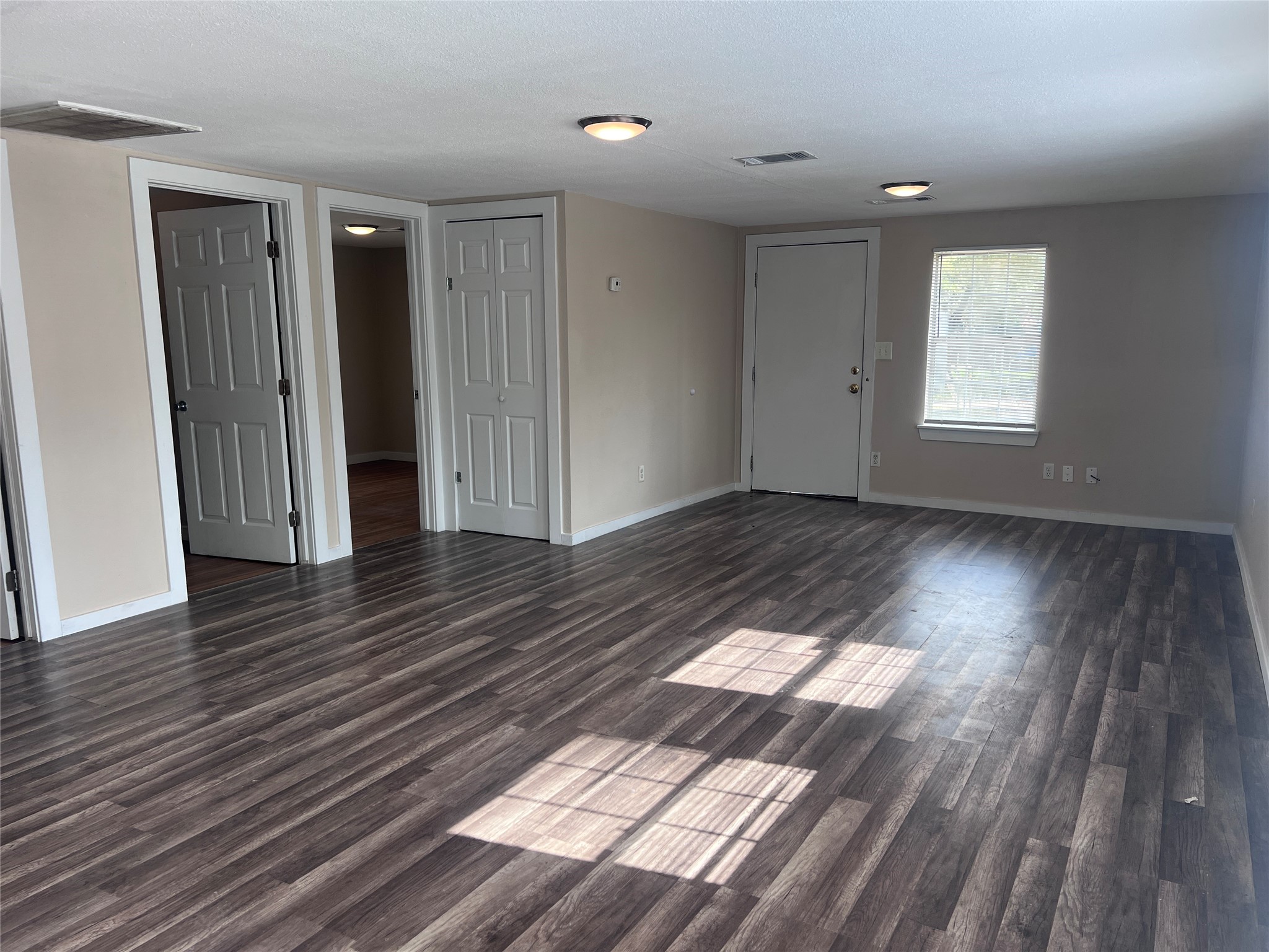 814 Sun Street Boling, TX 77420 - Photo 7 of 13 View from kitchen counter looking towards front door.