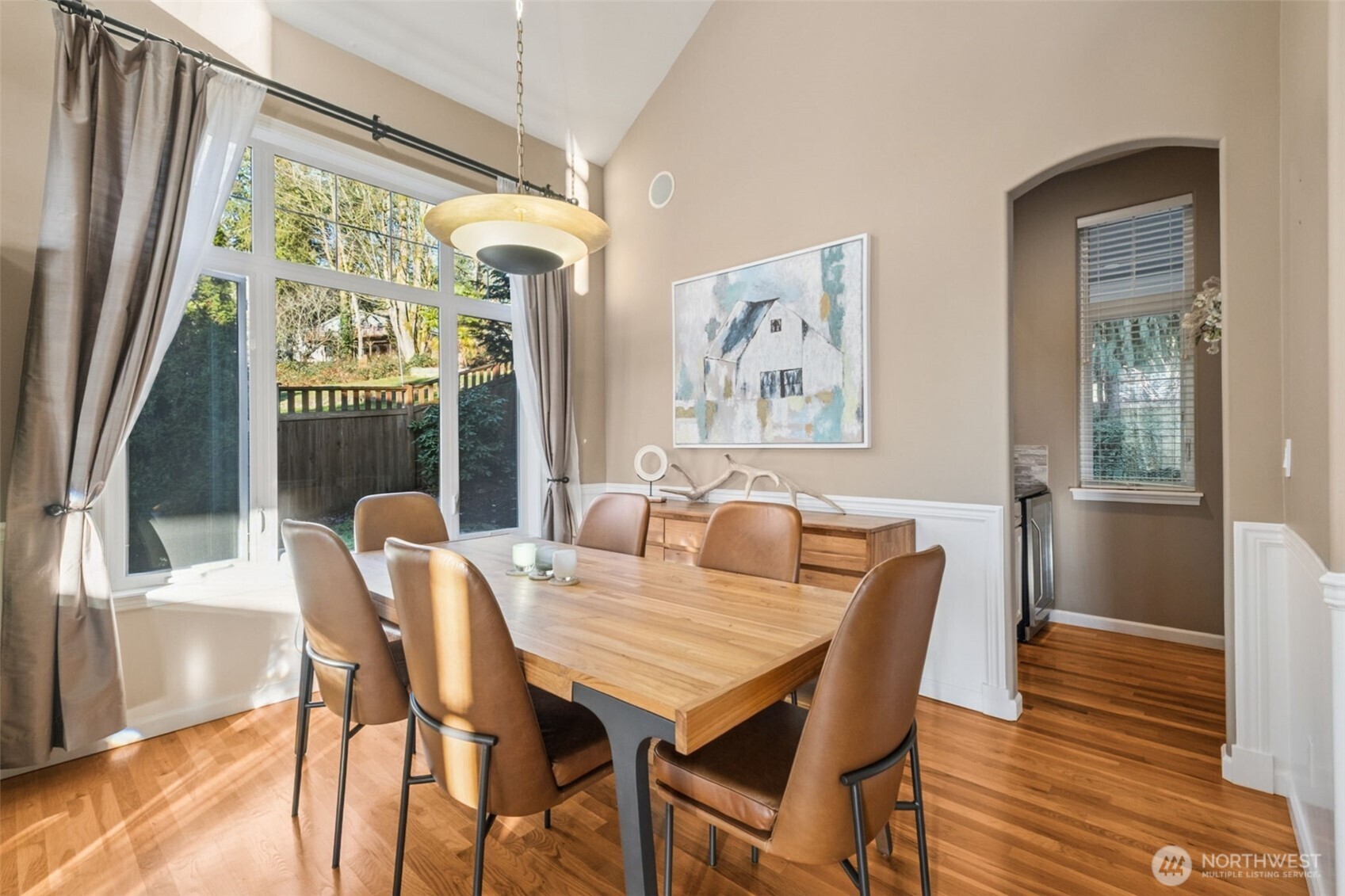 25913 Southeast 159th Street Issaquah, WA 98027 - Photo 11 of 40 a view of a dining room with furniture window and wooden floor