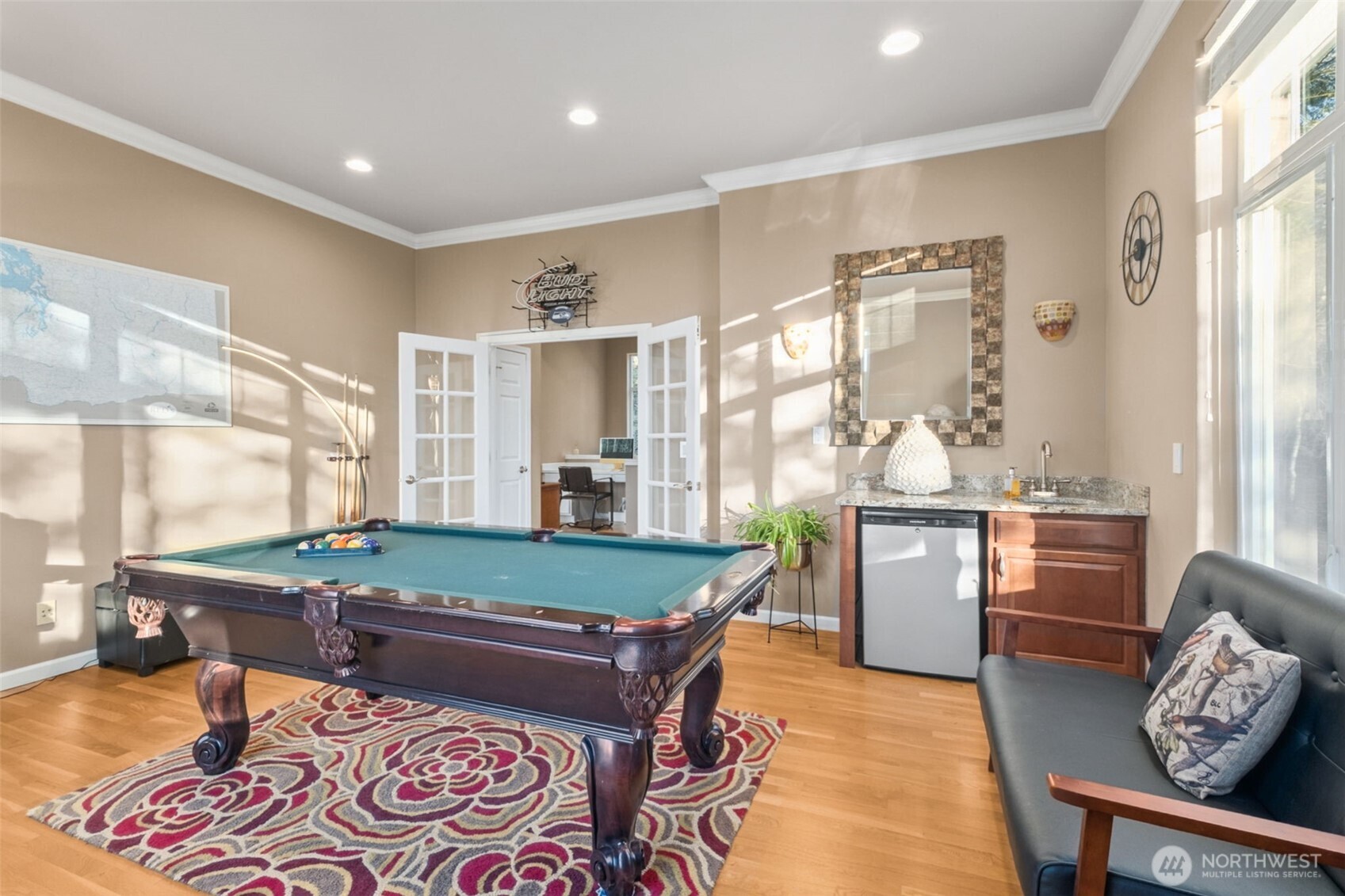 25913 Southeast 159th Street Issaquah, WA 98027 - Photo 22 of 40 a room with furniture and a large window